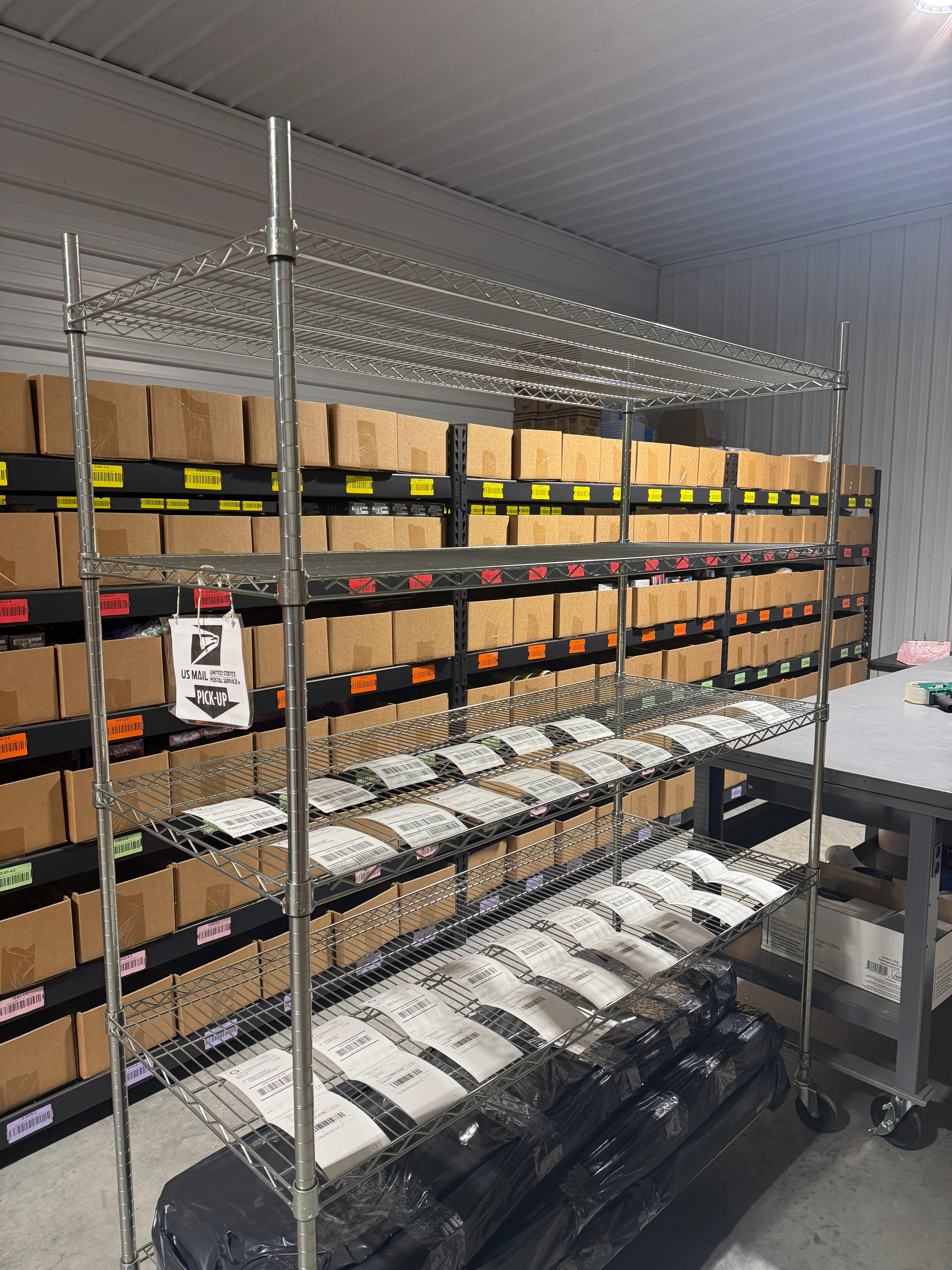 365PrepCenter warehouse operations — organized shelving and inventory management